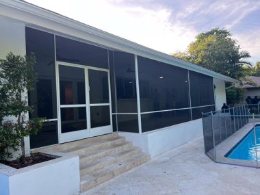 Patio screen enclosure providing privacy in Parkland, Broward County, South Florida