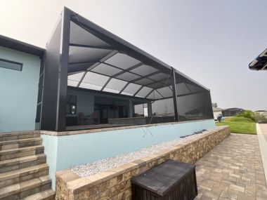 Aluminum pool screen enclosure engineered for HVHZ wind loads in Coral Gables, Miami-Dade County