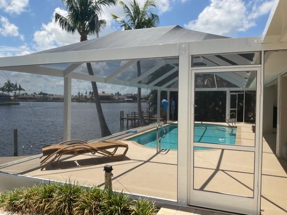 Pool cage installation with screened patio extension — AB Aluminum & Screens South Florida
