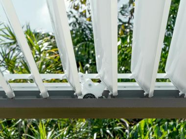 Motorized louvered roof over an outdoor living area in Coral Springs, Broward County, South Florida