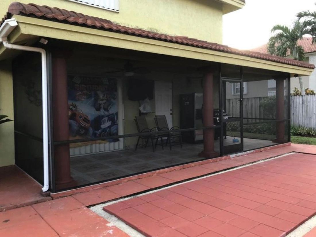 Screened patio enclosure in Pinecrest, Miami-Dade — comparing lanai, screen room and Florida room options