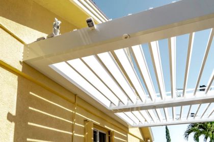 Motorized louvered roof in Boca Raton, Palm Beach County — what a louvered roof costs in South Florida in 2026