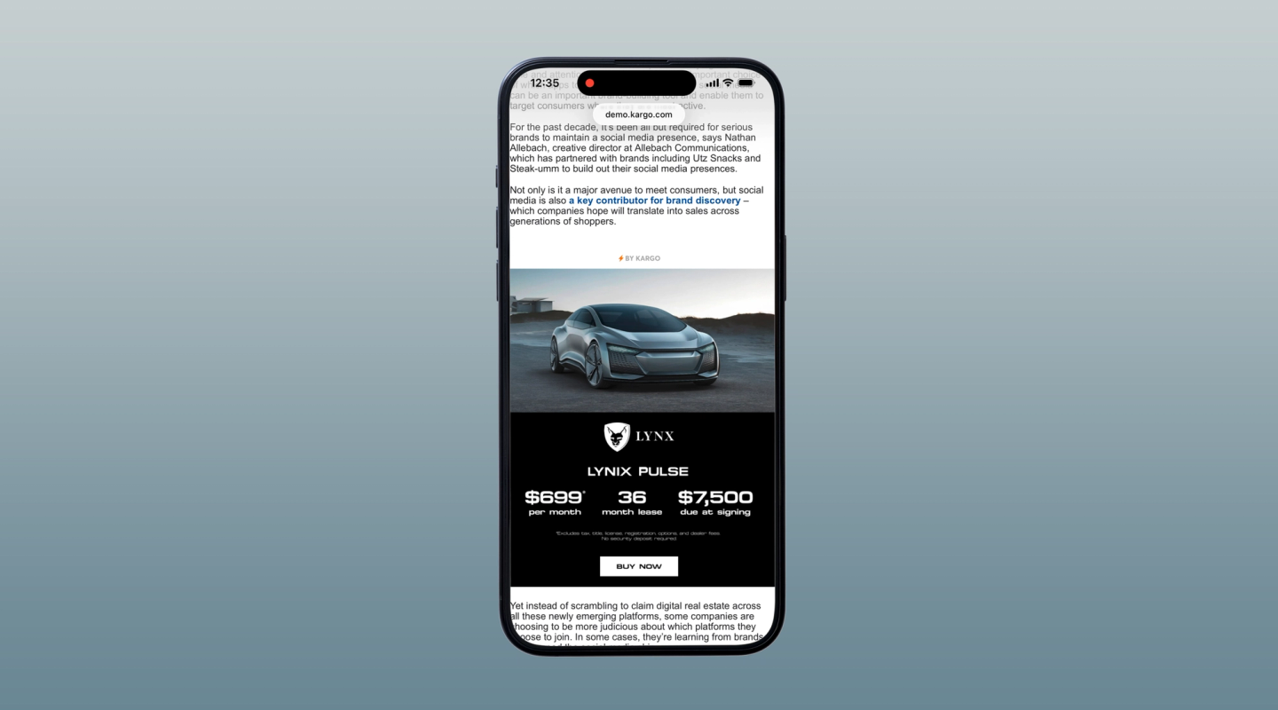 Smartphone as an interactive electric vehicle ad plays on screen against a blue background.