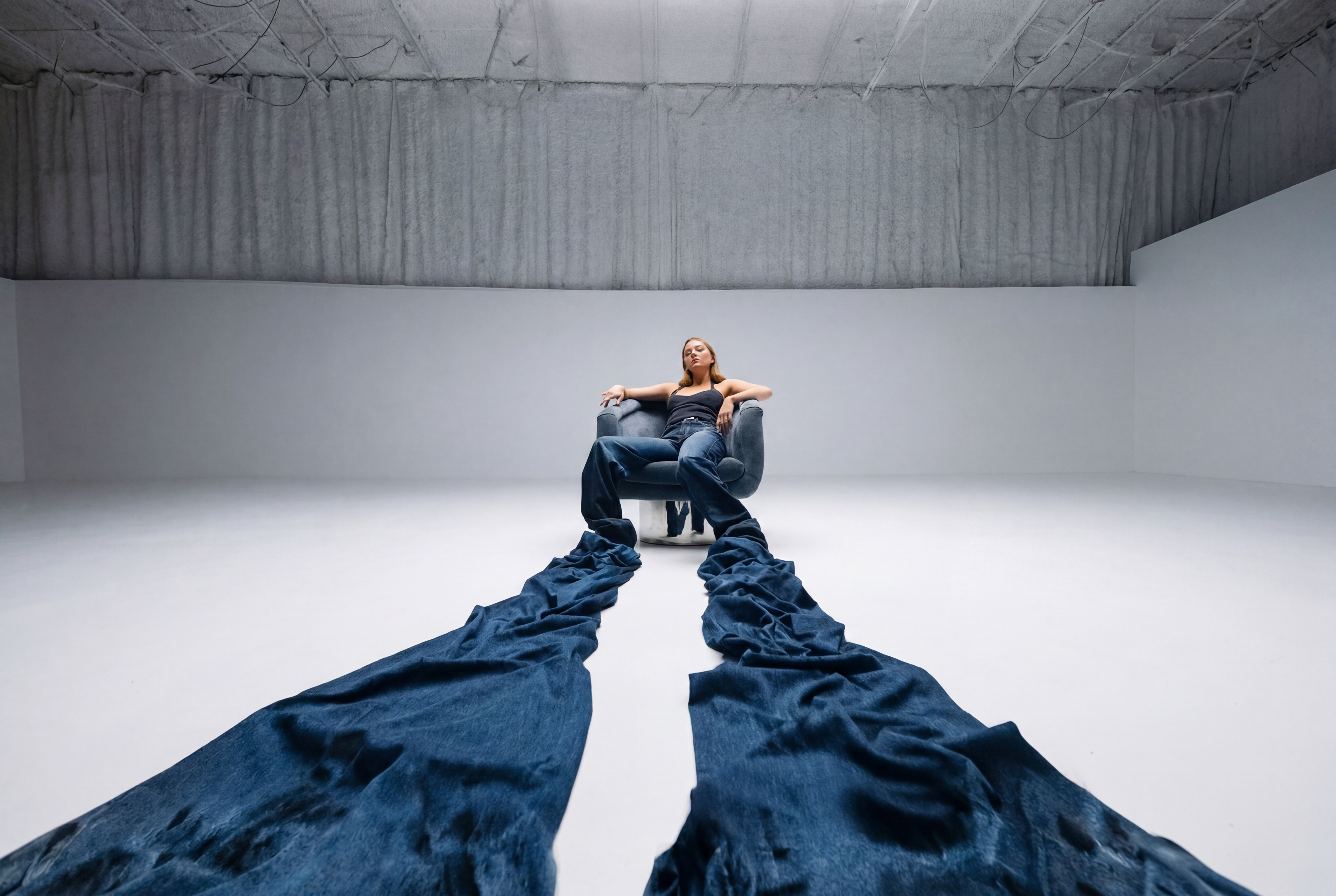 Lady sitting in room with long pants on