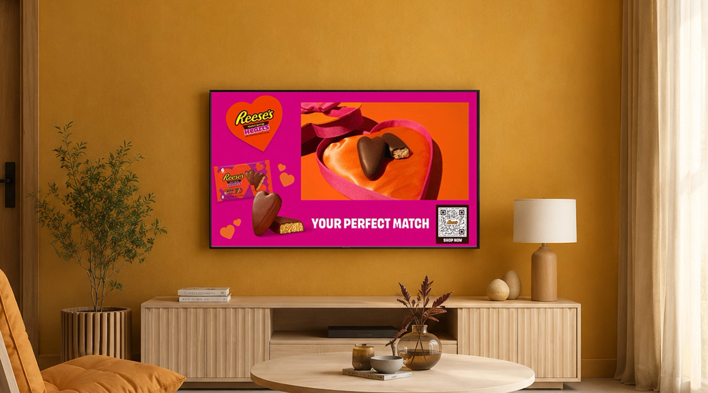 Photo of a TV displaying Herseys ads.