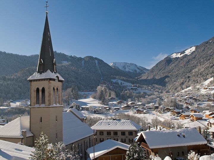 St Jean d'Aulps church spire and village in winter