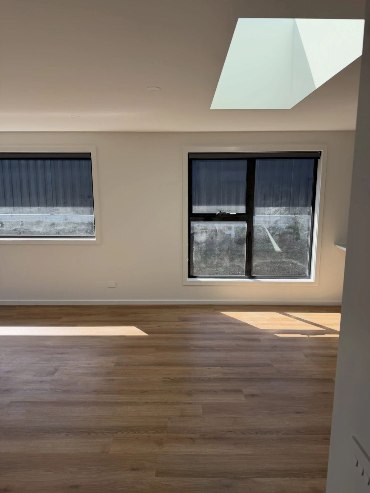 Living room walls and skylight in afternoon sun