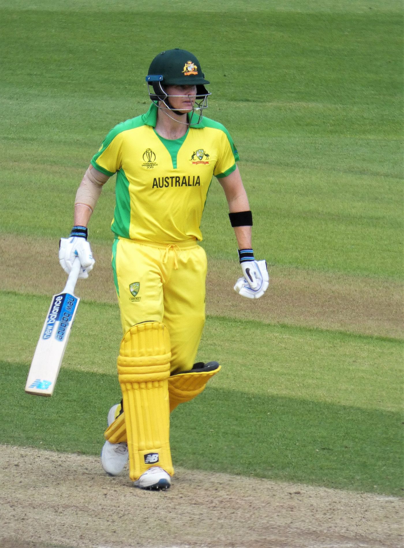 Australia batter Steve Smith walking with his bat during a match