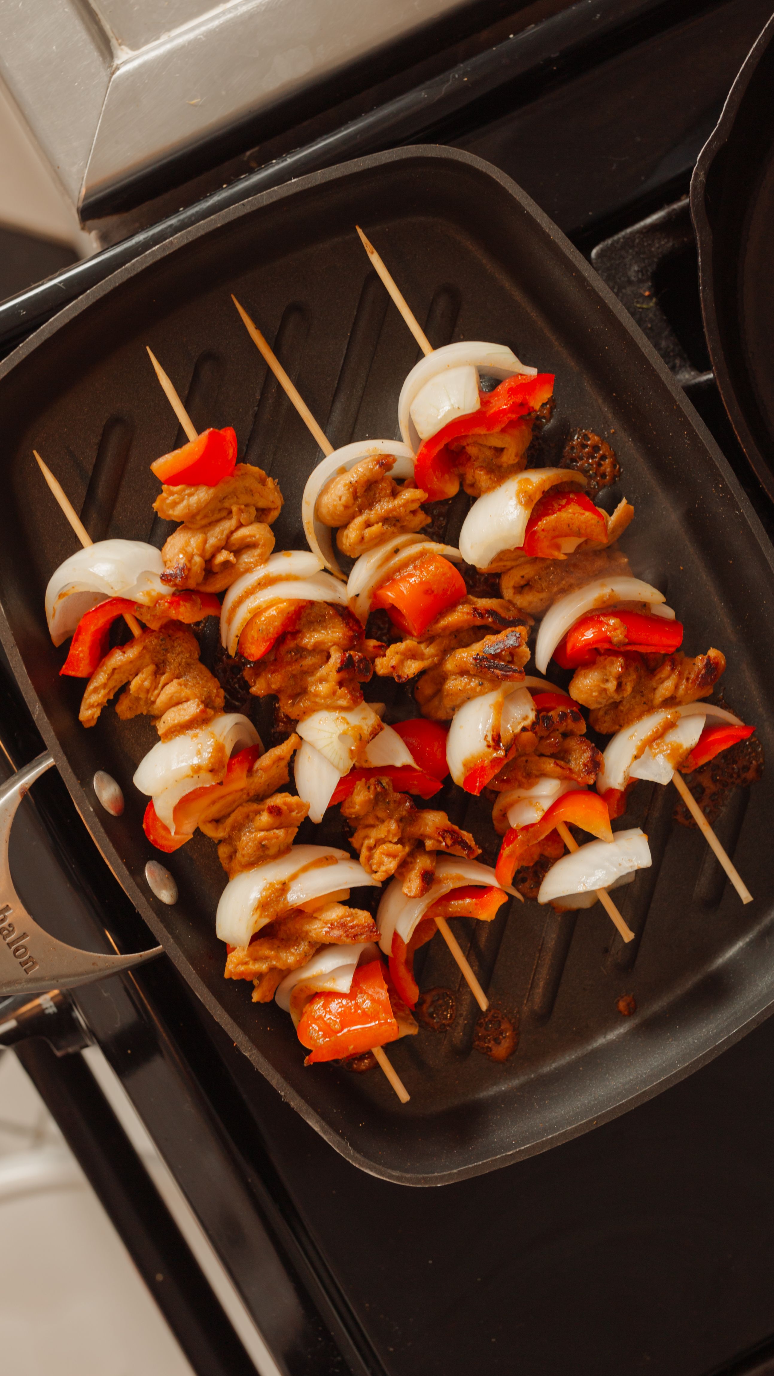 soy curls on a grill with bamboo skewers