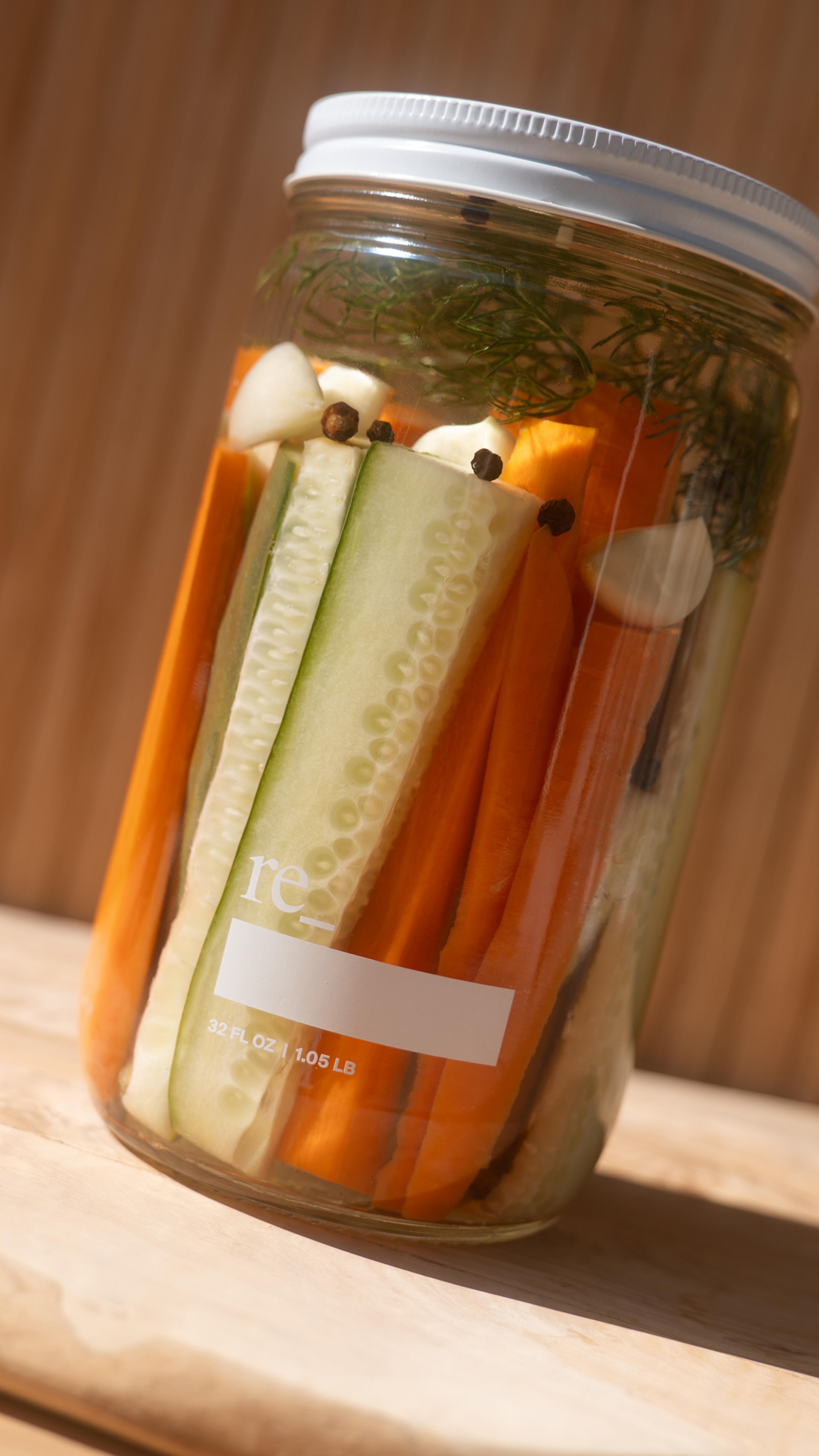 cucumber and carrot quick pickles in a re_ grocery 32oz jar