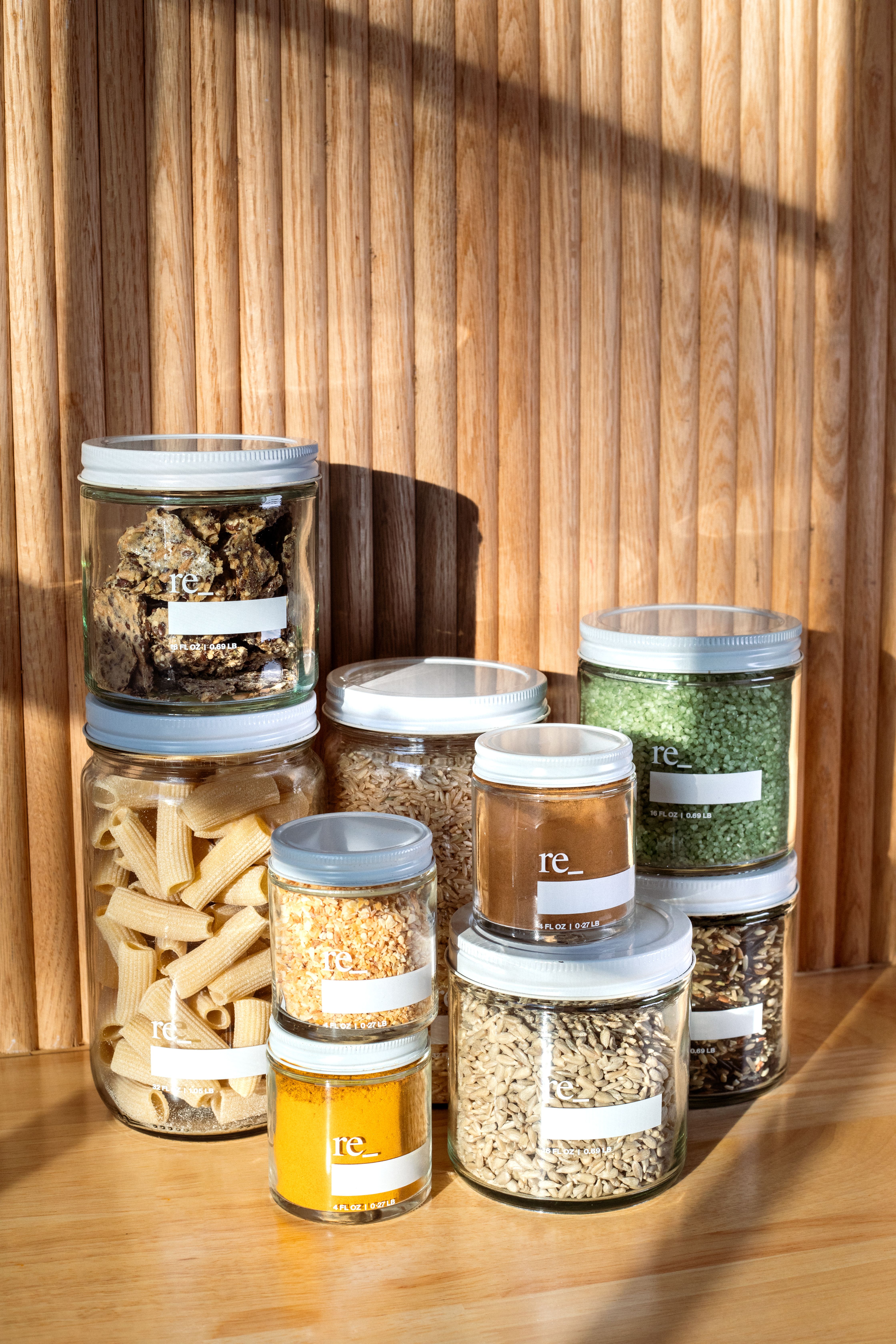 Glass jars: our re_ Glass Jars come in several sizes for zero waste grocery refills and meal prep alike. They look organized in your fridge, can be microwaved (without their lids), and allow you to see what’s inside for easy grab and go.