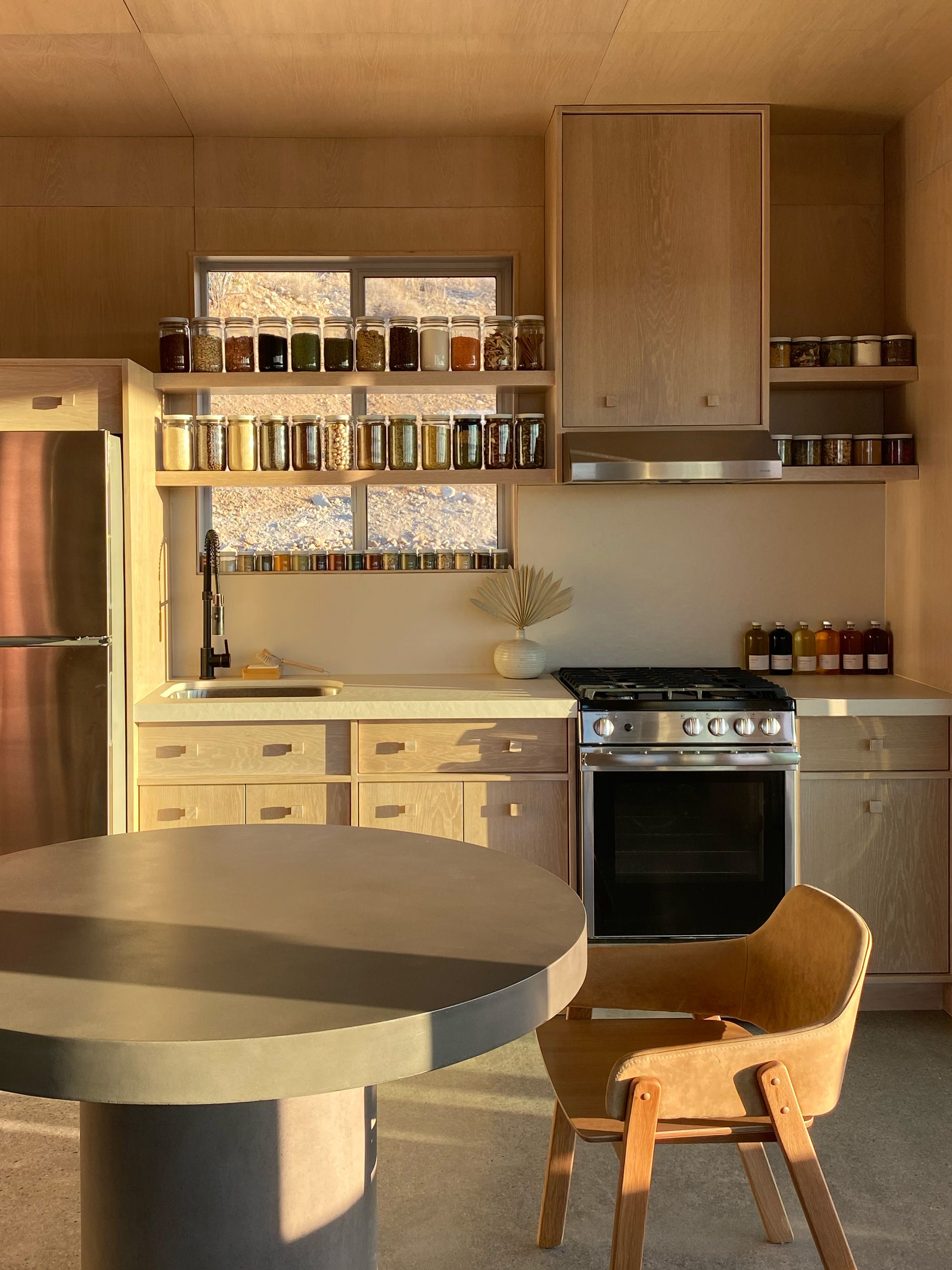 jars of bulk ingredients neatly lined up on display in kitchen