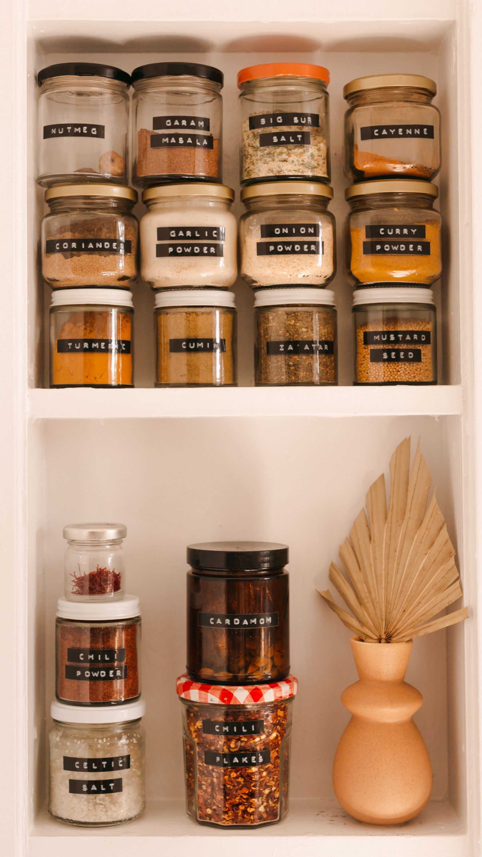 spices in jars with embossed labels