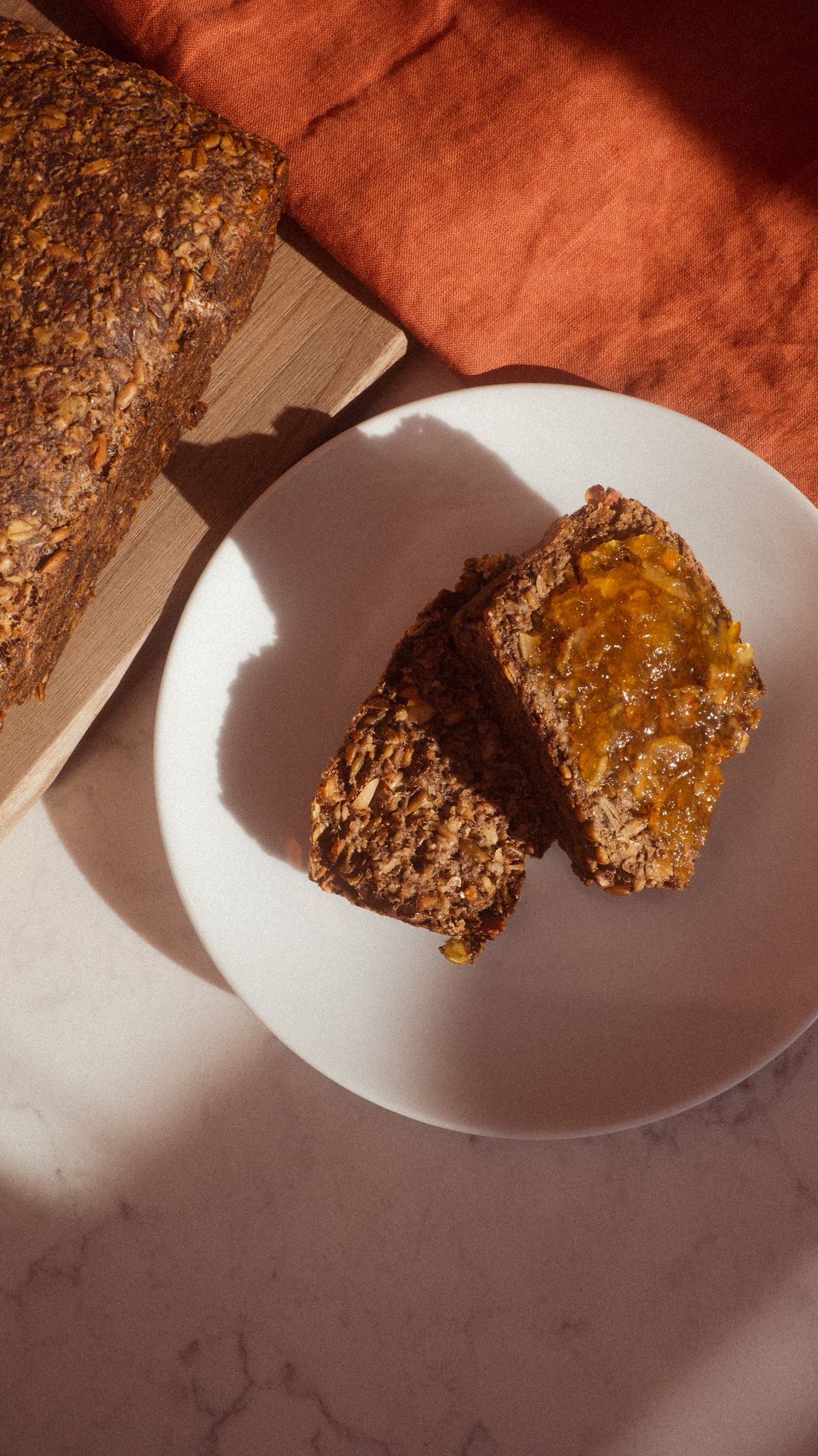 adventure bread with oats, almonds, sunflower seeds, pumpkin seeds, chia seeds and more