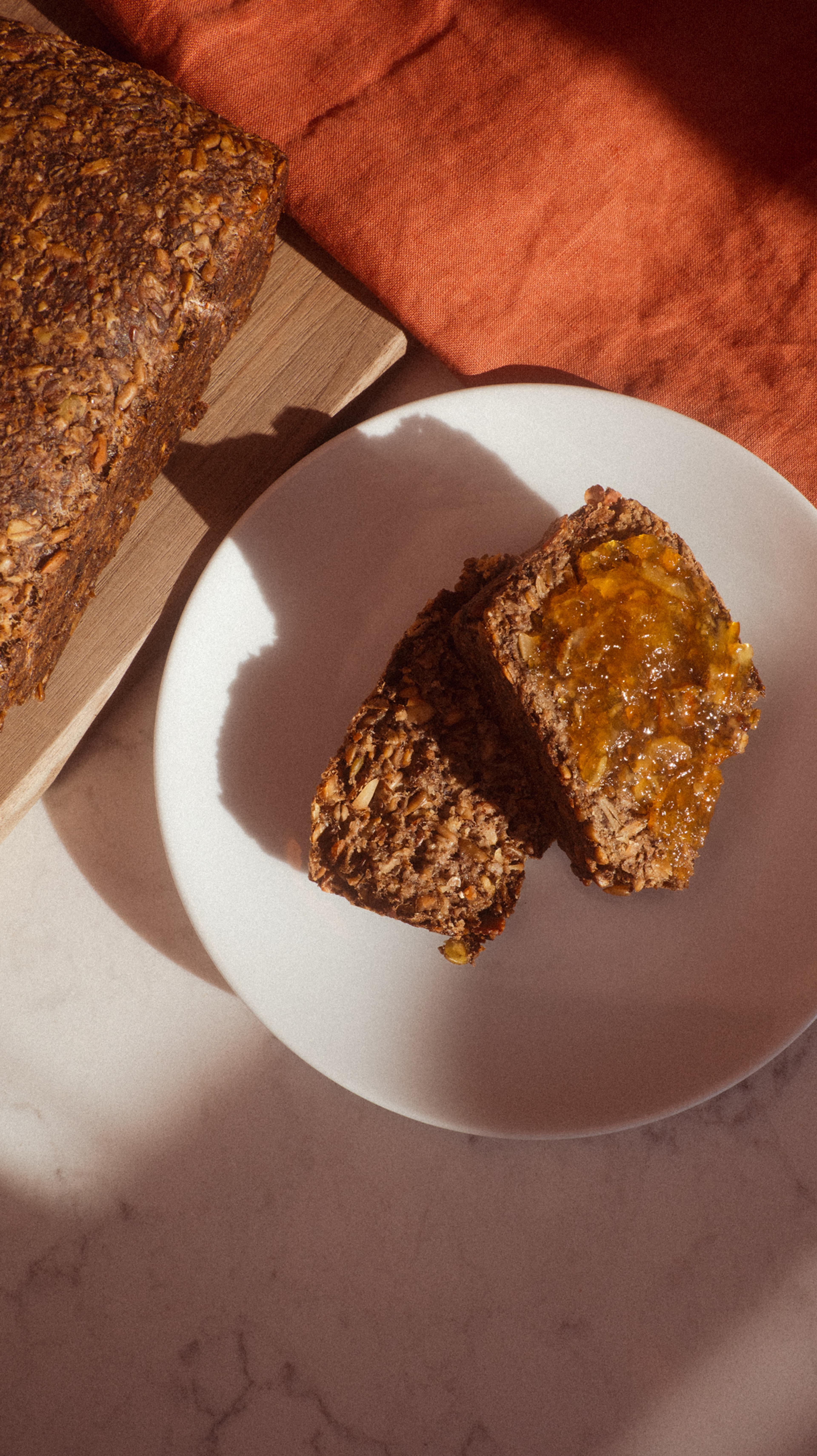 adventure bread with oats, almonds, sunflower seeds, pumpkin seeds, chia seeds and more