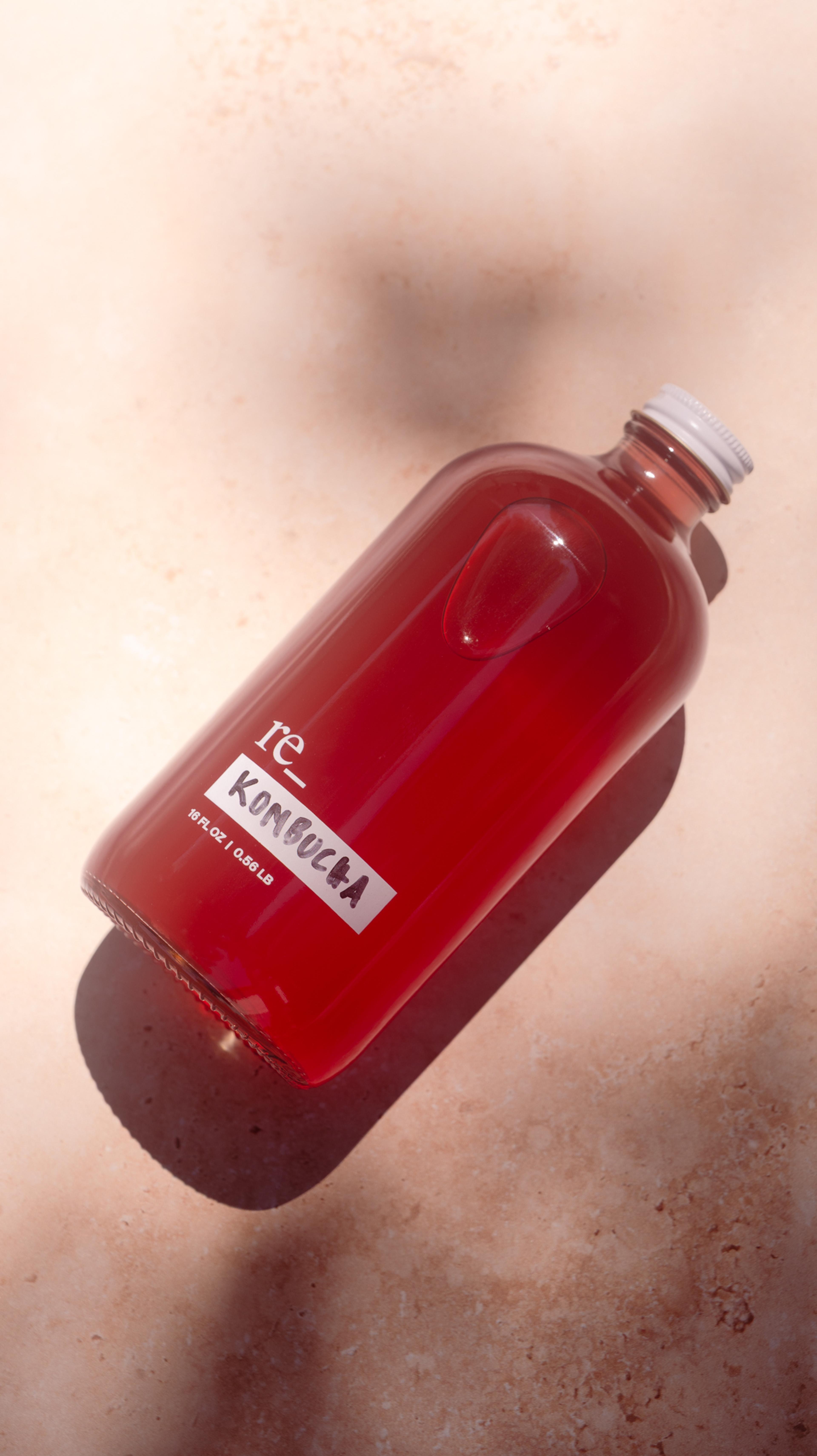 kombucha in a 16oz glass bottle