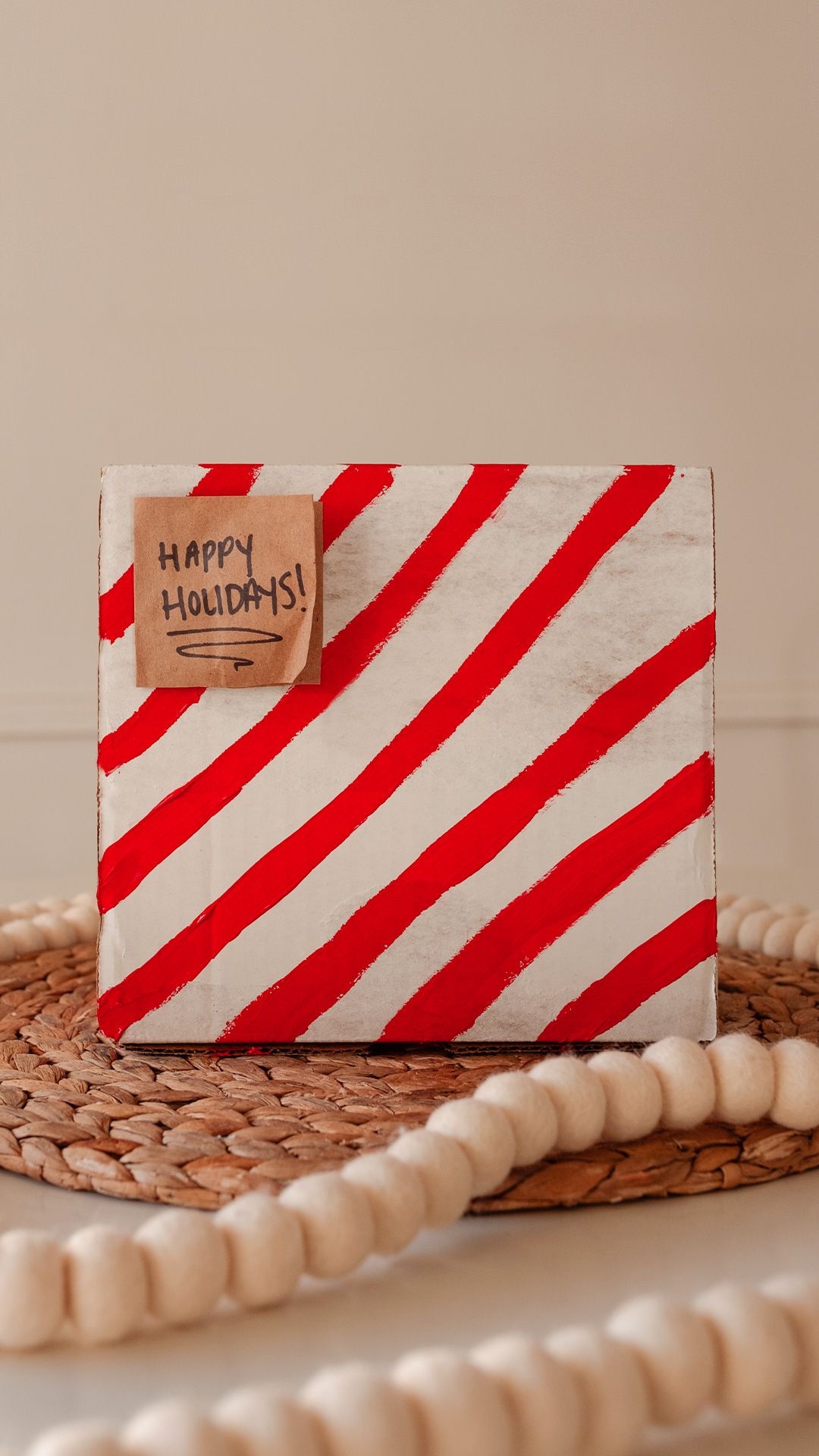 reused box and recycled paper for holiday gifting to make it zero waste and close the loop