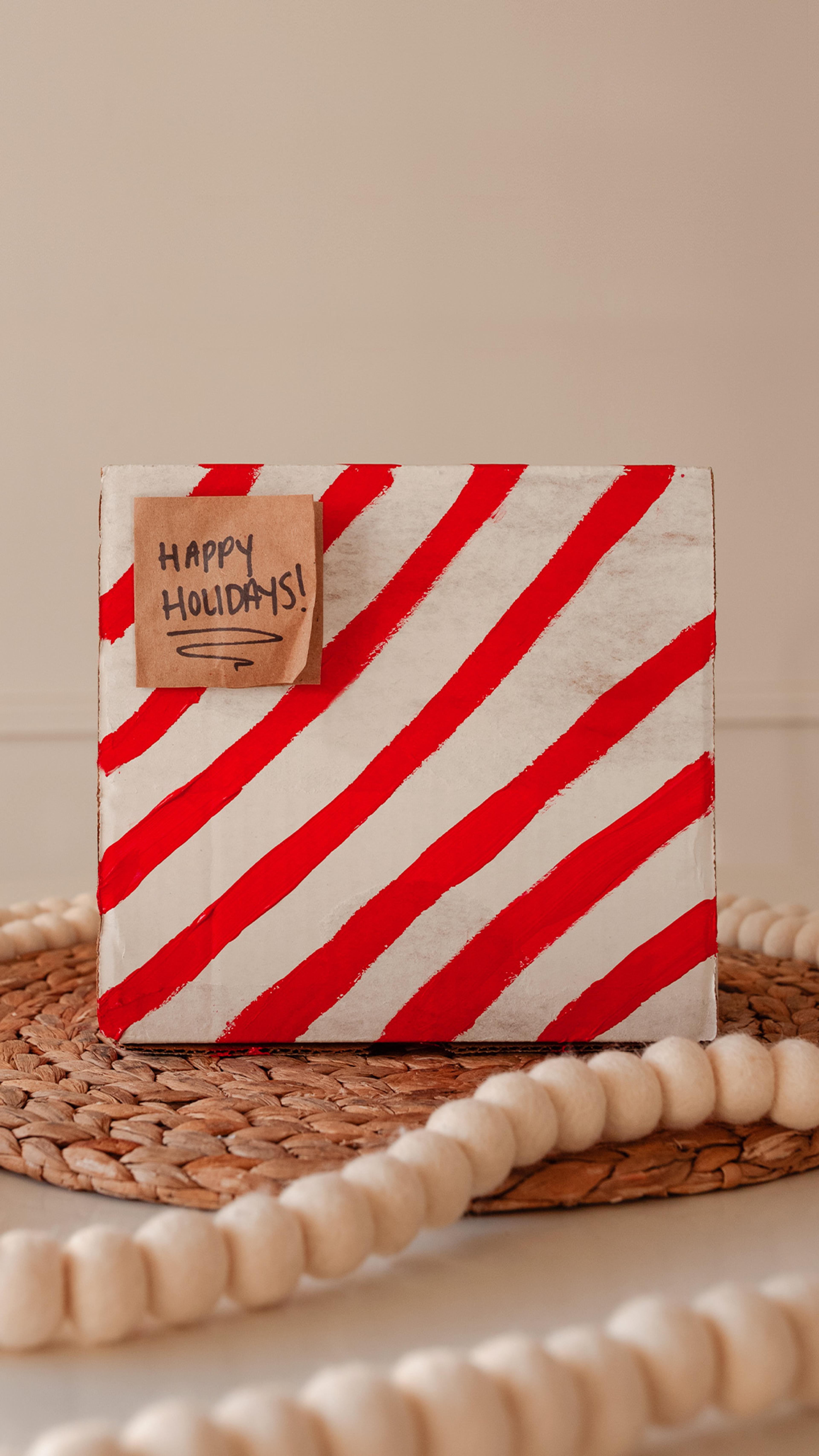 reused box and recycled paper for holiday gifting to make it zero waste and close the loop