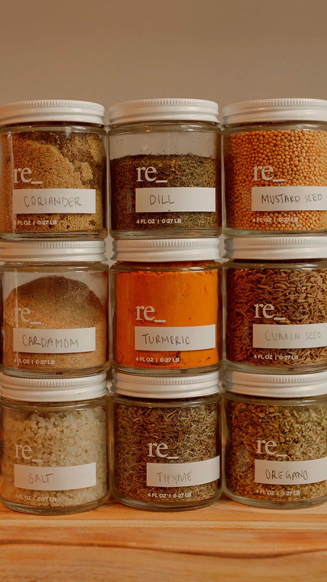 spices in reusable jars with ingredients labeled in pencil