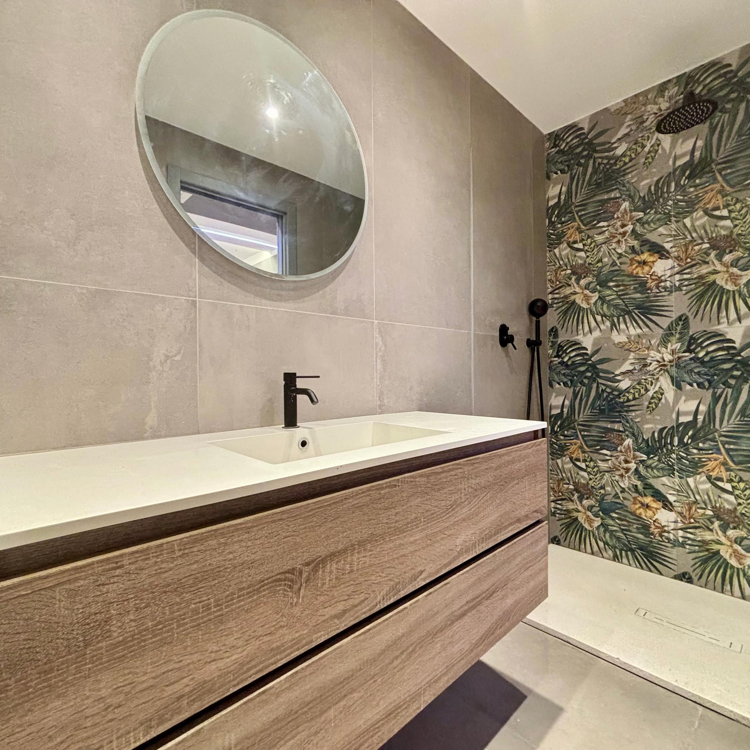 bathroom with sink mirror and shower