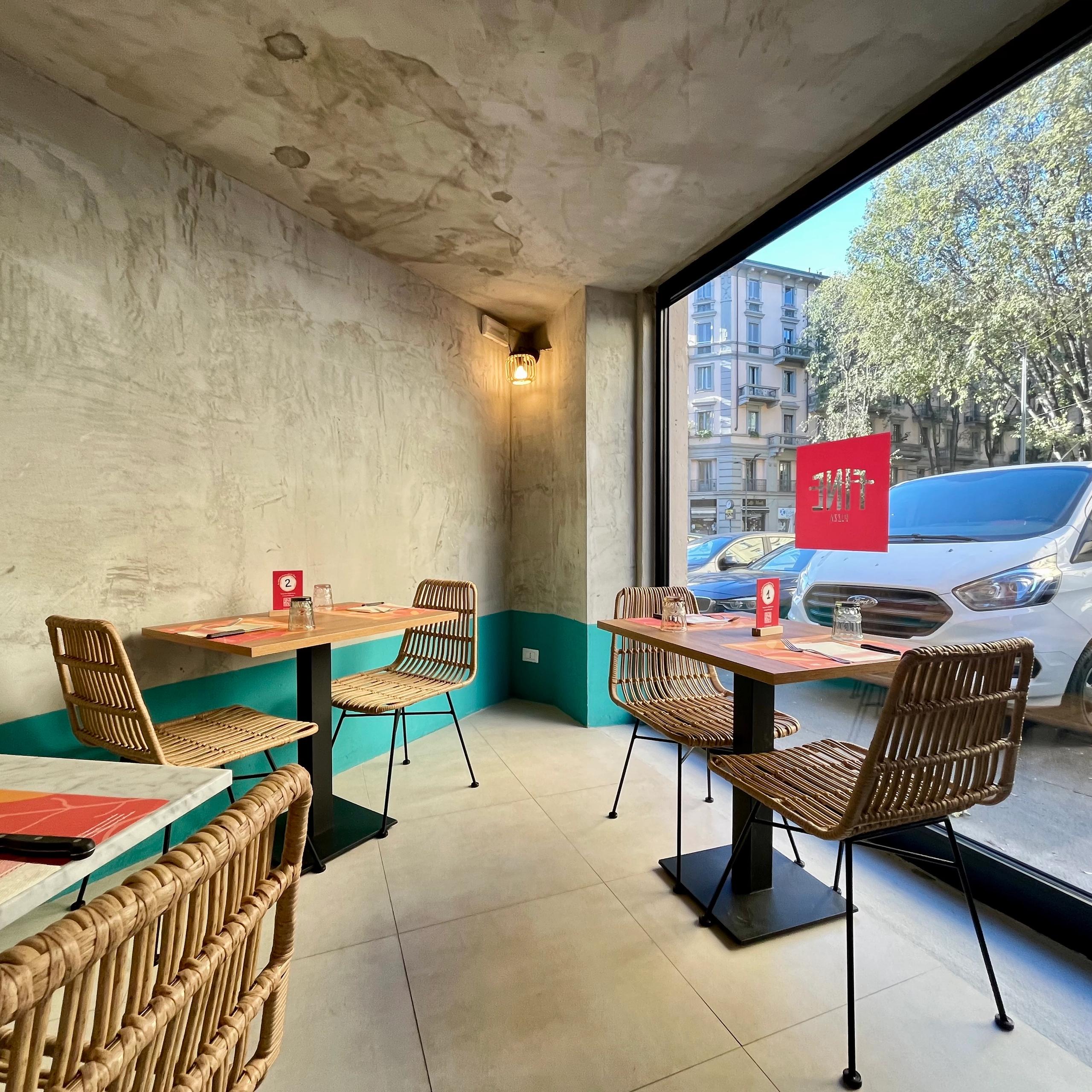 large display, table with chairs, van