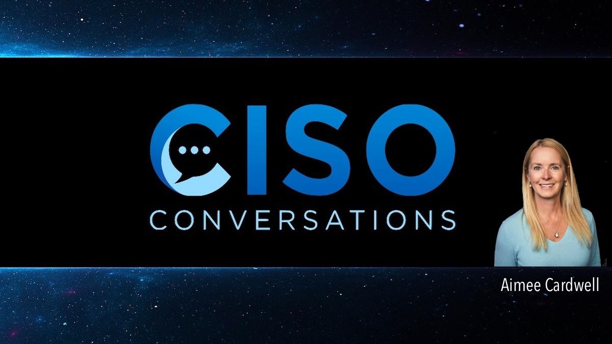The graphic features the text "CISO Conversations" with a speech bubble icon, set against a dark, starry background. A woman with long blonde hair in a blue top is pictured on the right side, with the name "Aimee Cardwell" displayed.