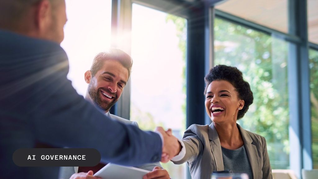 Three business people shaking hands and smiling, with "AI GOVERNANCE" text.