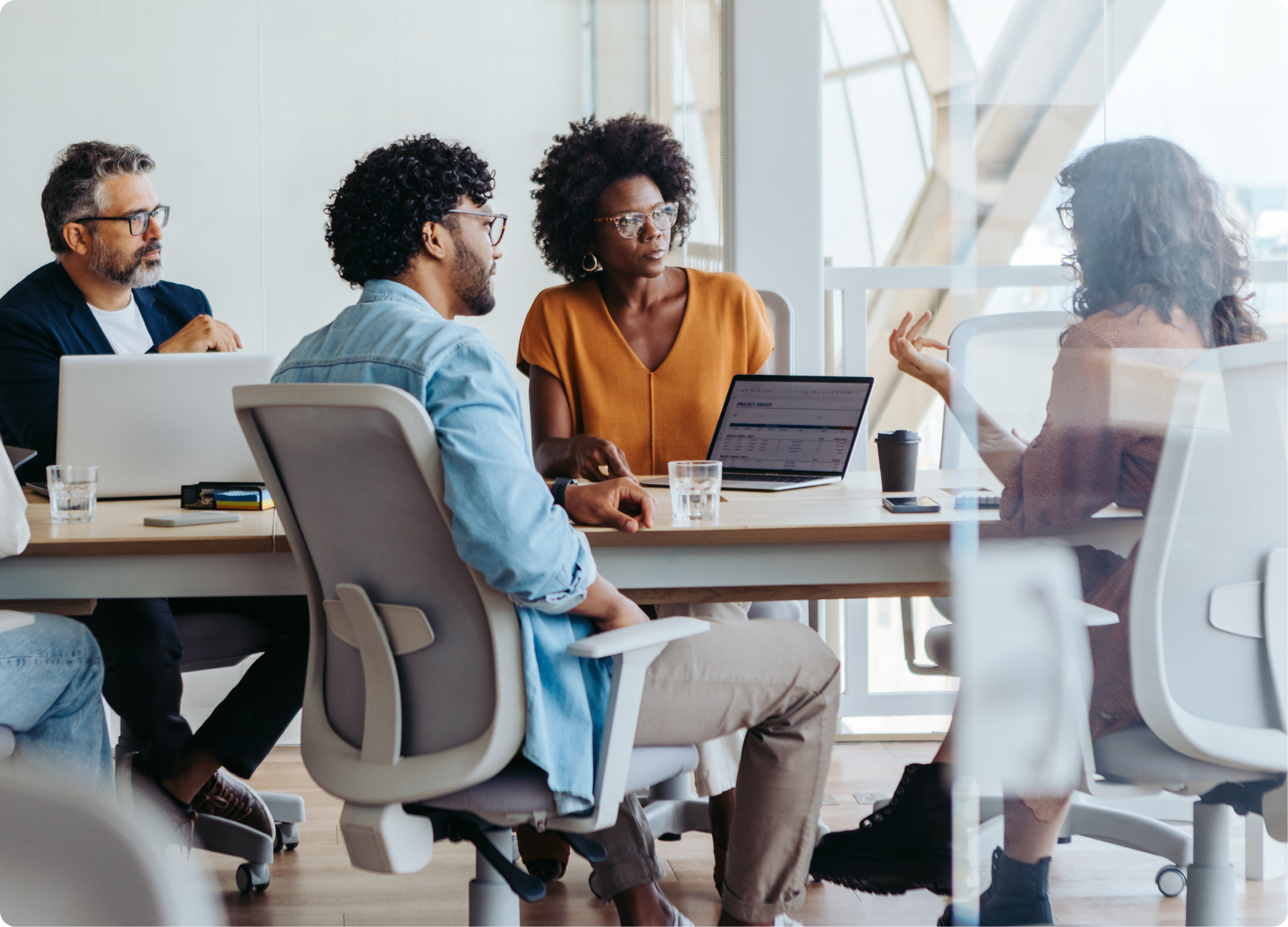 Group of professionals talking in a conference room