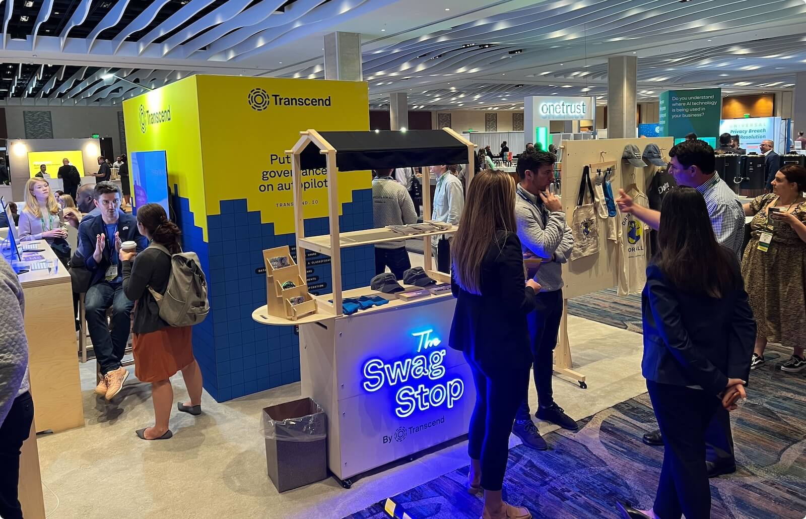 View of the transcend exhibition booth at trade show with crowd gathered around