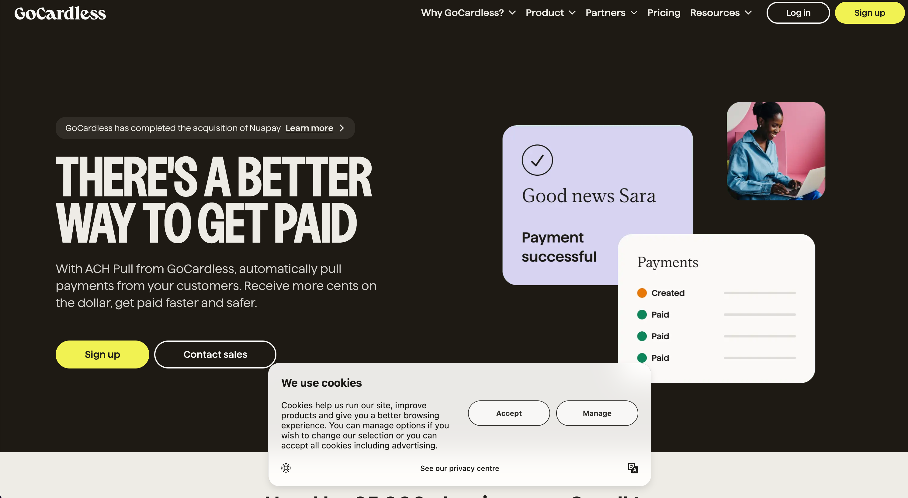 GoCardless website displays a message about a payment success update, highlighting the ease of getting paid with their service. The page includes a cookie consent notification at the bottom.