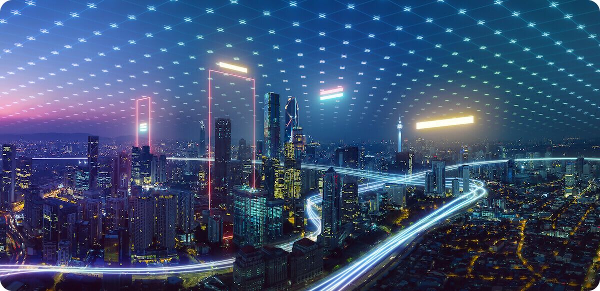 Modern city at night overlayed with traffic glowing lights and neon grid in the sky