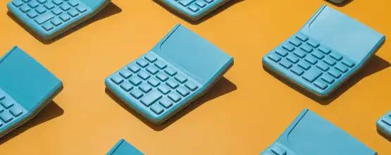 Series of teal calculator shaped objects on an orange background