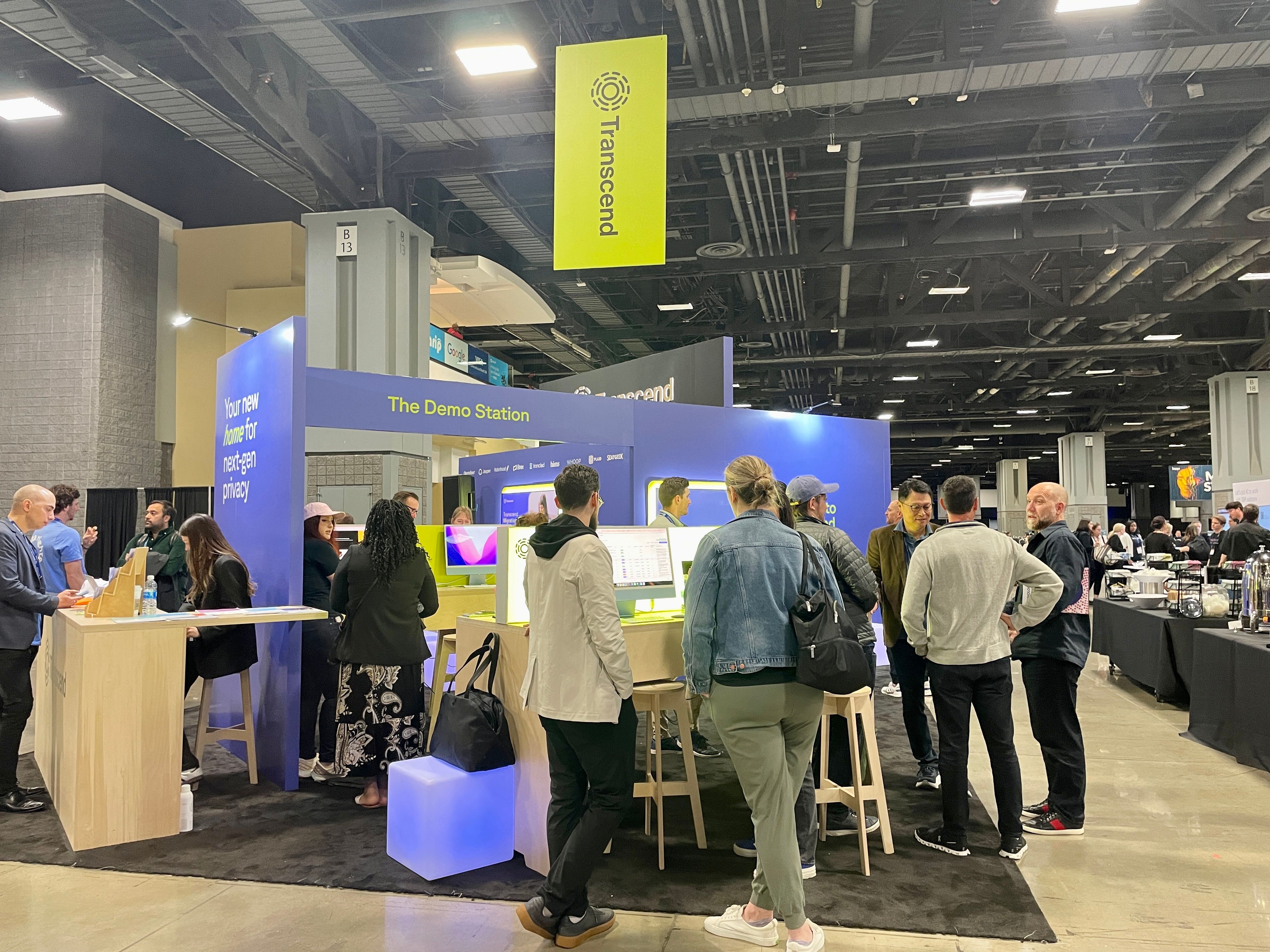 View of the transcend exhibition booth at trade show with crowd gathered around