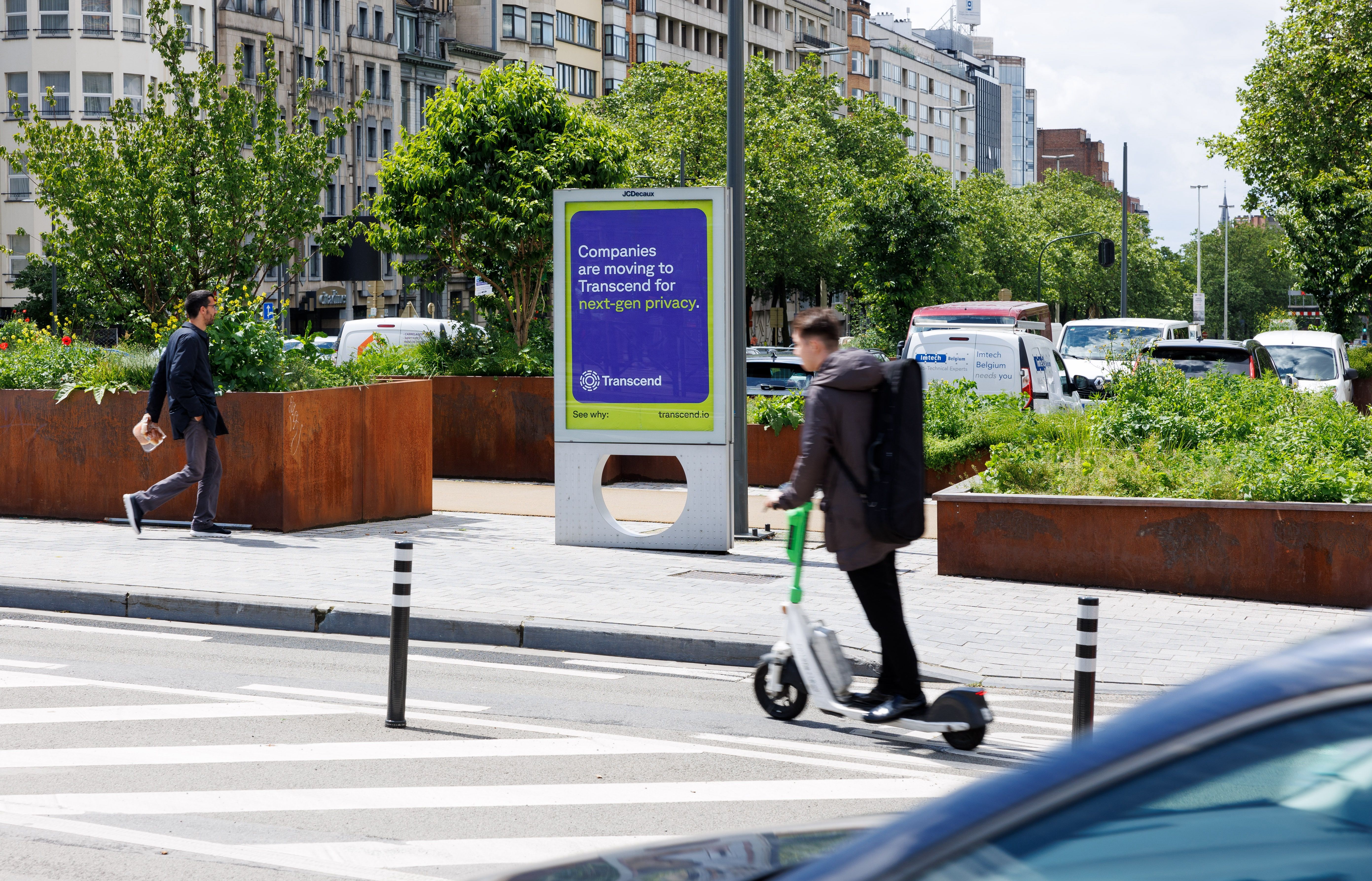 Transcend digital ads on a busy street in Brussels