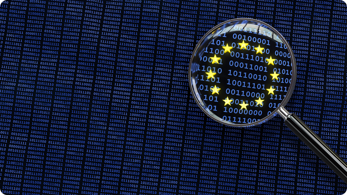 Magnifying glass over machine code and gold start, gives impression of viewing data or secure data