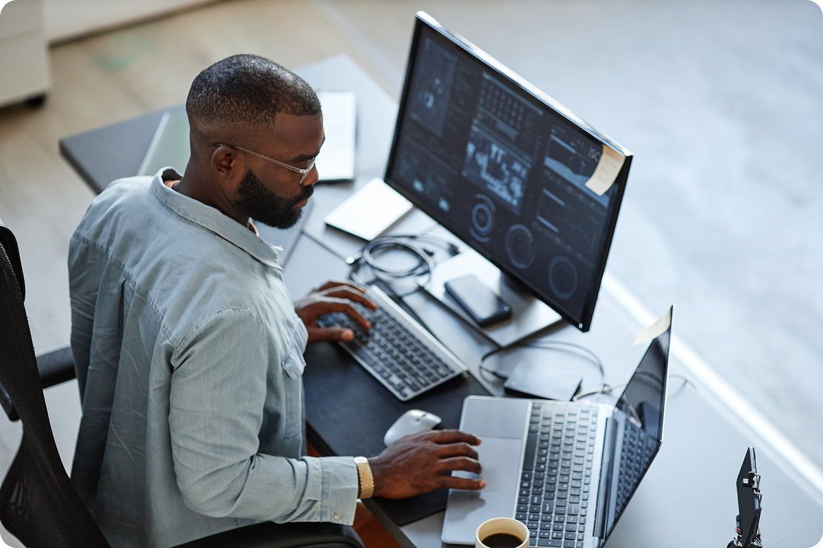 Young black web developer working on a data discovery and classification project