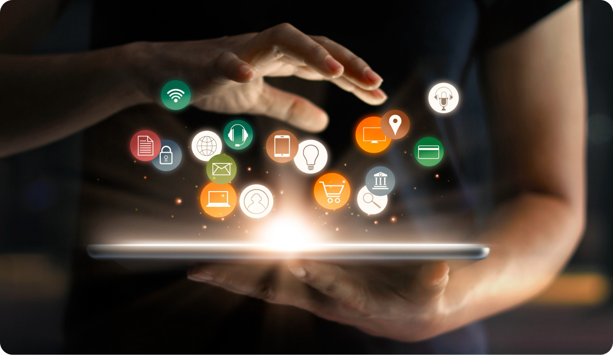 Tablet displaying icons like cart, wifi, bank, phone, email, web and so on to give a sense of ease when selecting digital tools