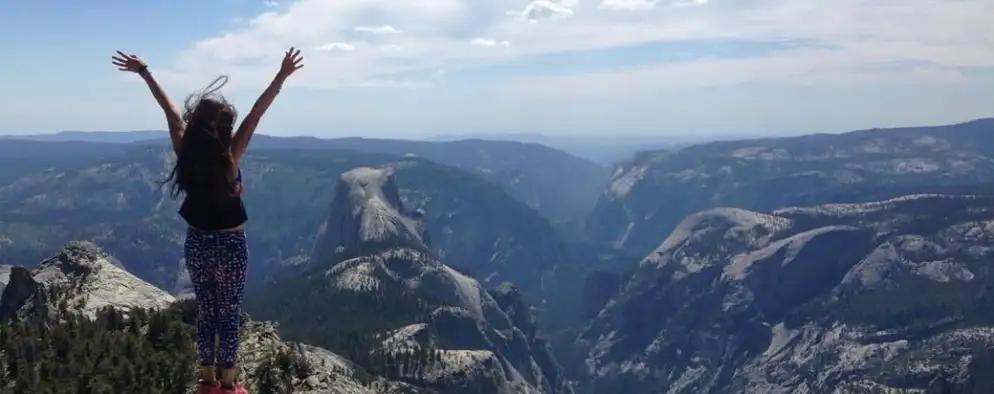 Nancy Fonseca at the top of a mountain