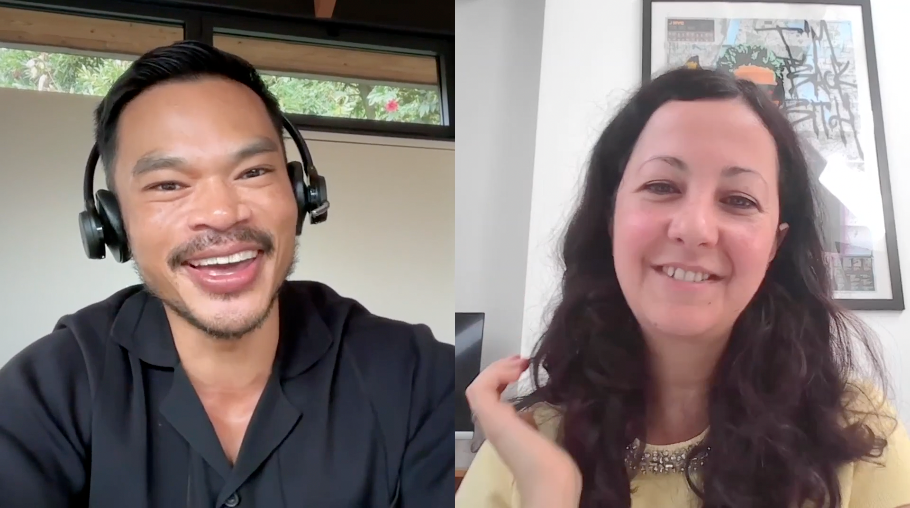 Two people smiling during a video call; the man on the left wears a headset and a black shirt, and the woman on the right has long dark hair and wears a light-colored top.