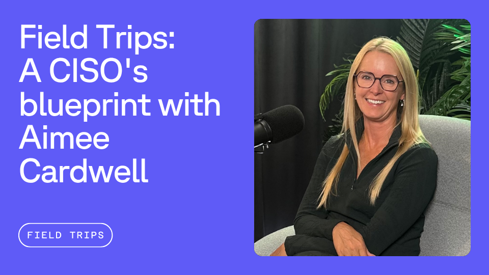 A smiling person with long blonde hair and glasses sits in a chair next to a microphone, with the text "Field Trips: A CISO's blueprint with Aimee Cardwell" displayed on the left.