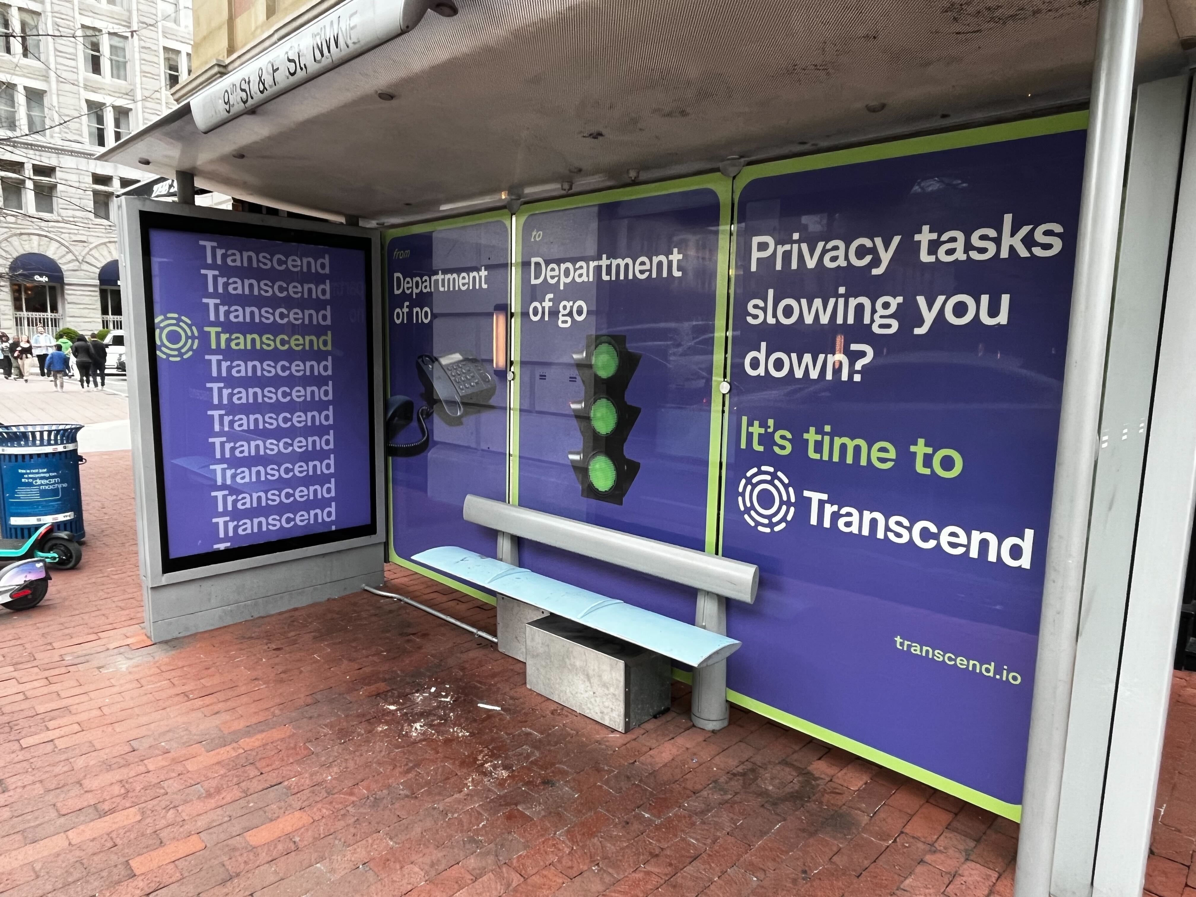 Bus stop advertisement display reading Privacy tasks slowing you down? its time to transcend