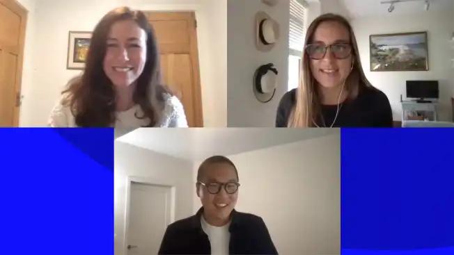 Two women and a man smiling during a video call, with one woman on the left, another on the right, and the man below them, each in separate home settings.