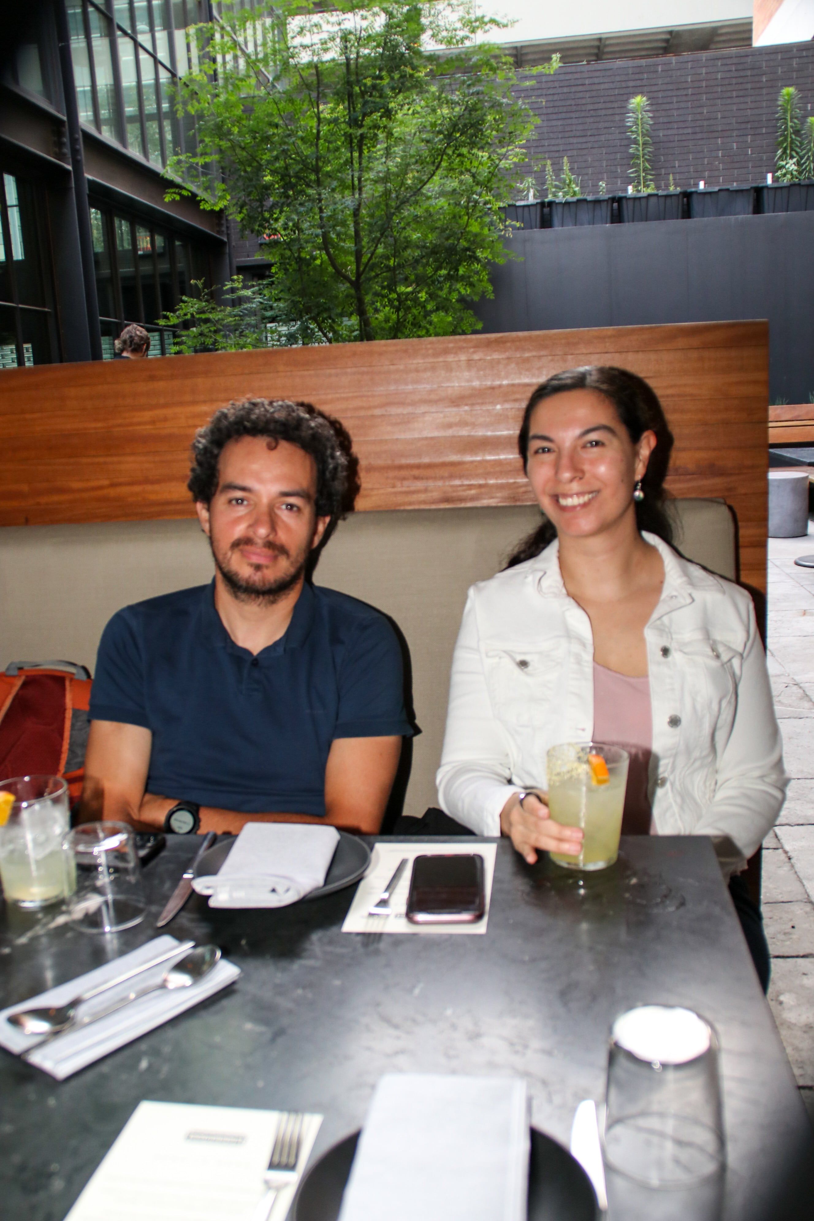 Transcend community enjoying dinner and drinks in upscale restaurant
