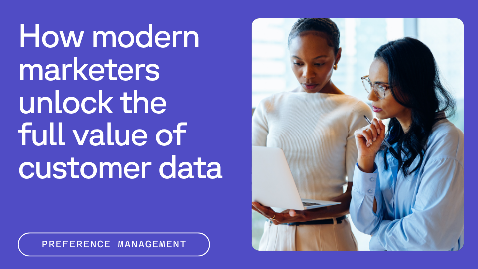 How modern marketers unlock the full value of customer data. Two women review a laptop together.