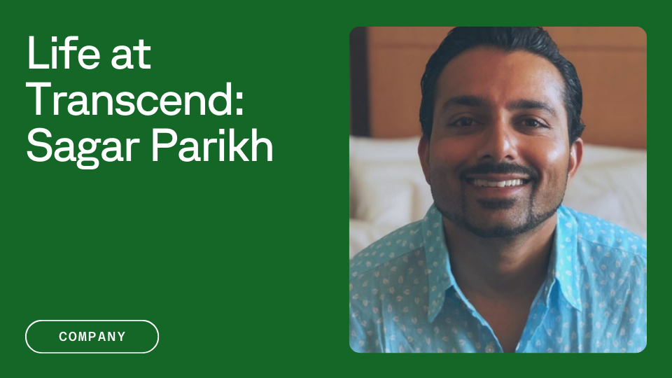 A man smiling, dressed in a light blue shirt, is featured on a green background with the text "Life at Transcend: Sagar Parikh" on the left, along with a "Company" button below.