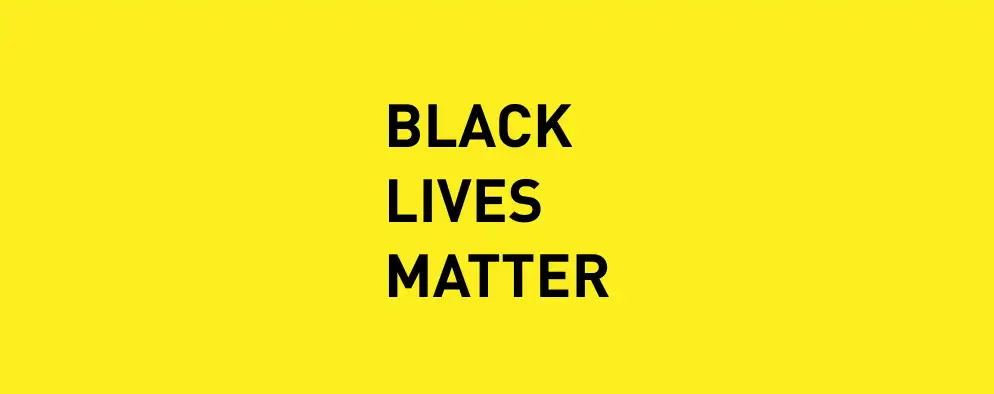 Yellow background with black text reading Black Lives Matter