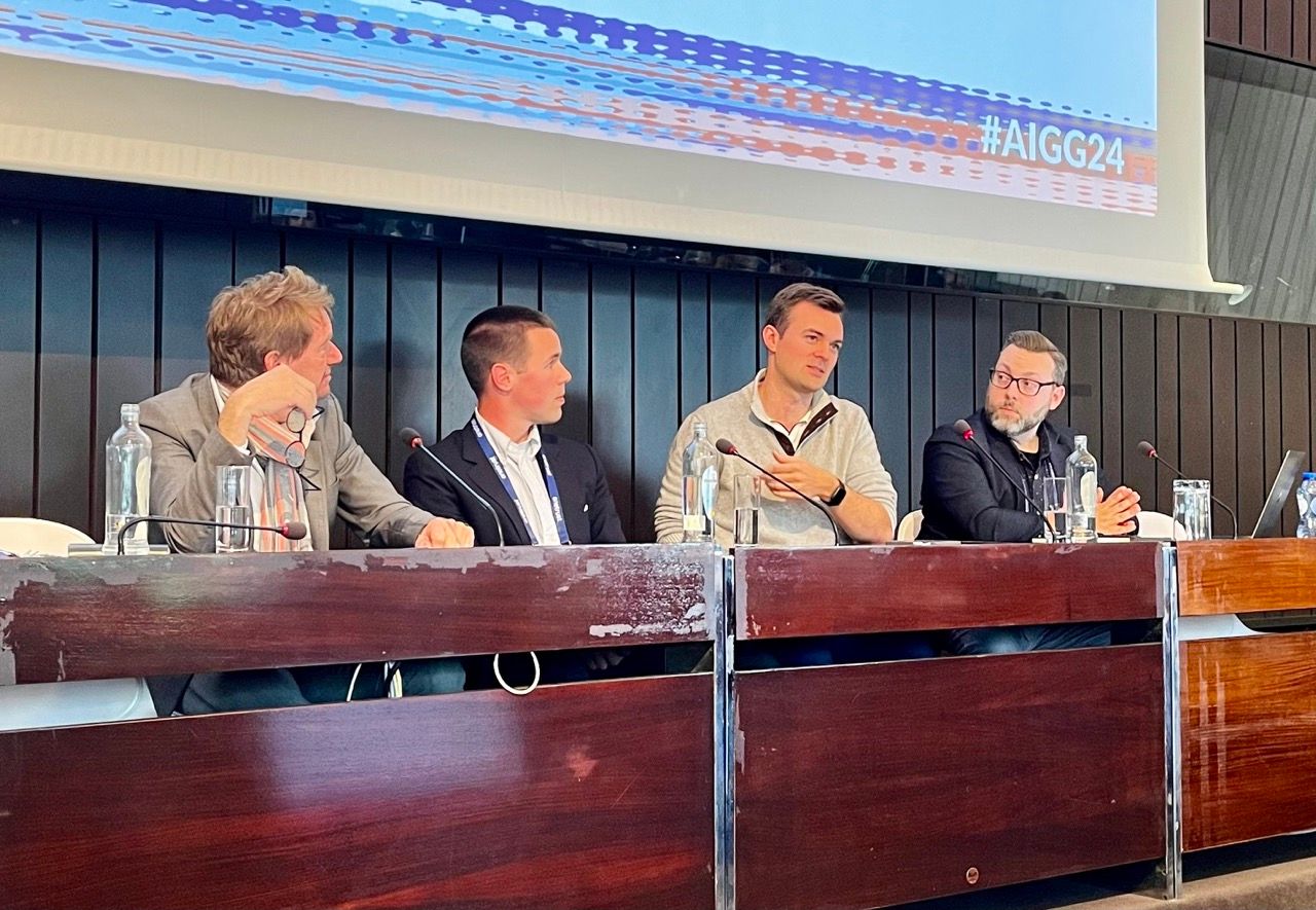 Alan Wilemon, Ben Brook, Alex Rindels, and Yann Padova speaking on a panel at IAPP AI Governance Global in Brussels