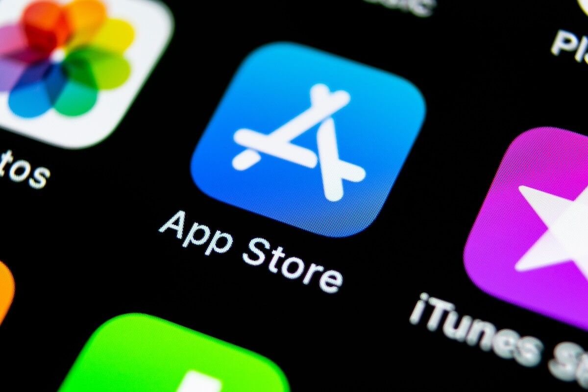 Closeup of an iphone screen focused on the app store logo