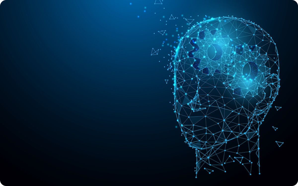 Rendering of human head made up of interconnected polygon shapes on blue background