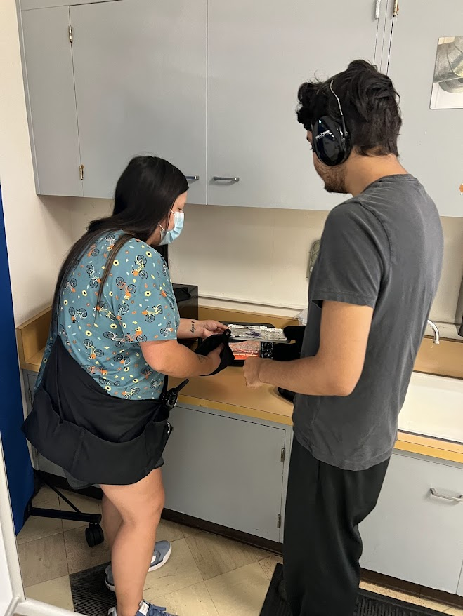 Students and staff at Creekside engaging in a learning activity.